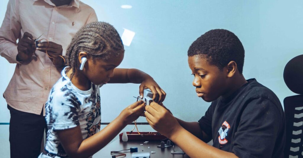 Children collaborating on electronics project in a workshop, fostering STEM education and teamwork.
